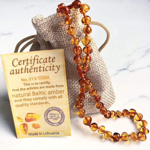 Baltic amber hot sale necklace benefits